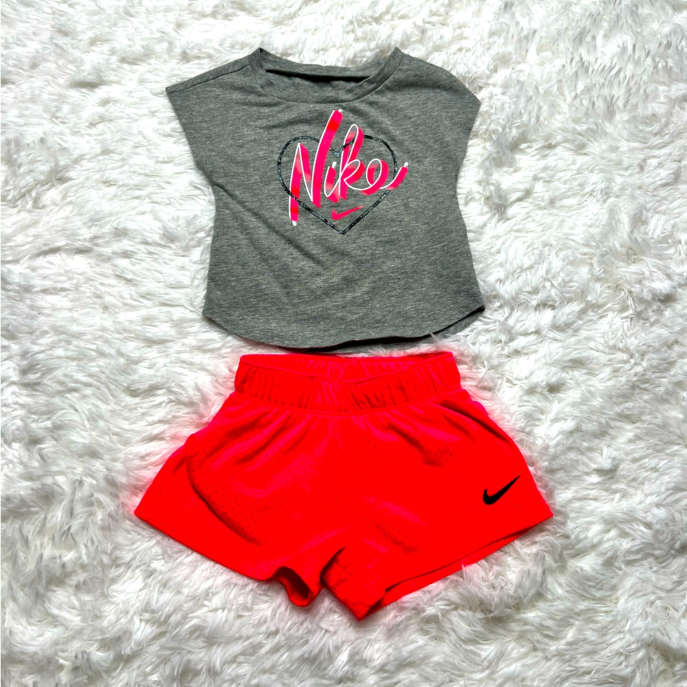Pink Nike knit t-shirts with matching mesh pink athletic shorts 12M